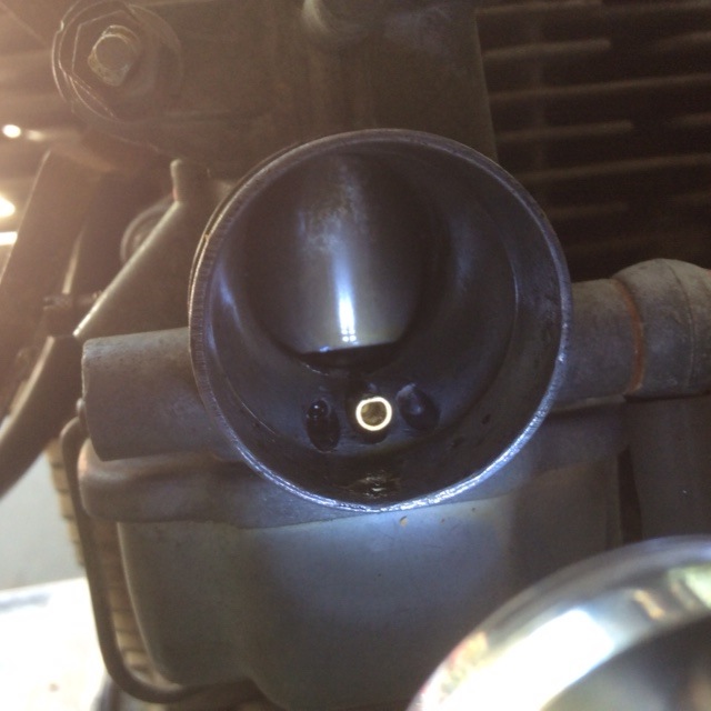 Left carb slide as low as it will go.
